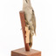 Grey-headed Woodpecker attached to a sloping vertical wooden mount presenting front-left