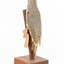 Grey-headed Woodpecker attached to a sloping vertical wooden mount presenting back-left