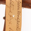 Close up of paper swing tag - see transcript