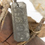 metal tag, see transcription