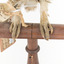 Ural Owl mounted on wooden perch pedestal with swing tag. 