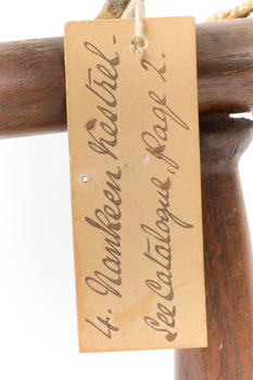 Nankeen Kestrel facing front, close up of identification swing tag with catalogue page number