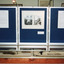 Colour photograph of three display board sections showing information and photos for 'The Harvest' exhibition at  the Burke  Museum in 1999.