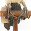 Little Pied Cormorant taxidermy specimen standing on a wooden mount facing towards the left