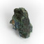 A hand-sized solid mineral specimen in shades of blue, green, and yellow