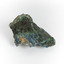 A hand-sized solid mineral specimen in shades of blue, green, and yellow