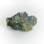 A hand-sized solid mineral specimen in shades of blue, green, and yellow.