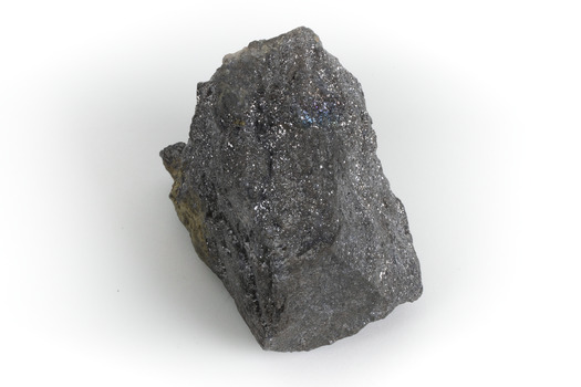 A grey and silver speckled hand-sized solid mineral specimen.