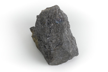 A grey and silver speckled hand-sized solid mineral specimen.