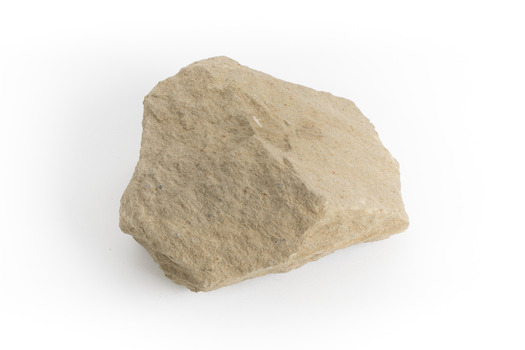 A pale brown/creamy brown coloured rock that is roughly the size of a hand. Sandstone is a sedimentary rock 