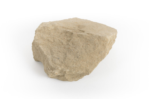 A pale brown/creamy brown coloured rock that is roughly the size of a hand. Sandstone is a sedimentary rock 