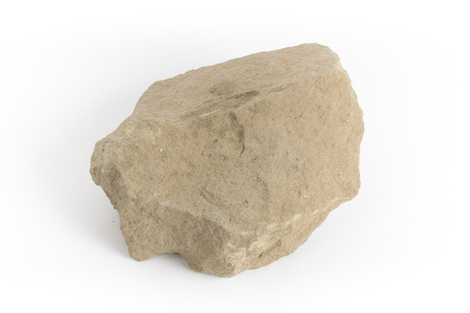 A pale brown/creamy brown coloured rock that is roughly the size of a hand. Sandstone is a sedimentary rock 