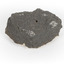 A hand sized geological specimen in shades of grey and white