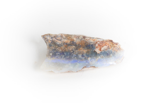A mineraloid specimen which has a light blue "play-of-colour" in the centre 