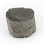 A small cylinder shaped piece of Basalt with smooth sides and broken top and bottom edges. 