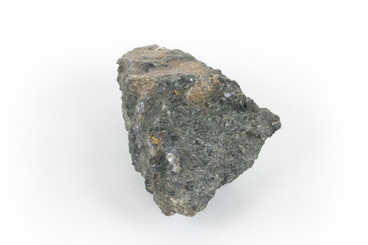 A hand-sized mineral specimen in shades of silver and black