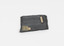 A rectangular metamorphic specimen, dark grey almost black in colour