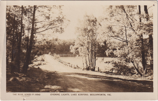 Sepia photograph of pathway road beside Lake Kerferd. Trees line the bank.