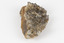 A large hand-sized copper mineral in shades of brown and gray