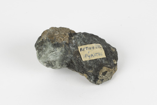 A small-medium-sized solid specimen containing two minerals with shades of brown, black/grey, and white