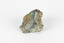 Small mineral specimen in shades of white, green, orange and gray