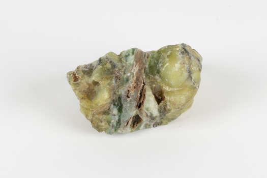 A solid mineral specimen in shades of yellow and gray-green. 