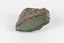 A rock specimen of compact green fine grain rock 