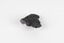 Image shows a medium-sized piece of rough gemstone with a purple interior and dark grey exterior crust. 