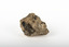 A small textured caramel-coloured rock with matte dark and light brown patches. Slight indentation on the left side, revealing small brushstrokes of a glassy dark brown colour with the imprint of a star visible.