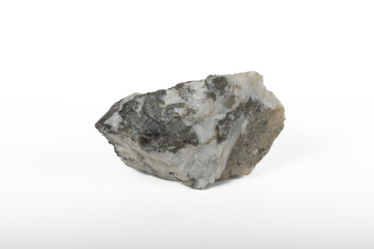 Solid mineral specimen in shades of grey, white and black