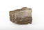 A solid mineral in shades of brown, white, and beige