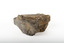 A solid mineral in shades of brown, white, and beige