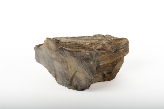 A solid mineral in shades of brown, white, and beige