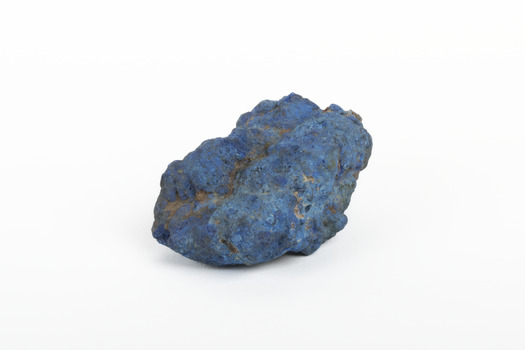 A solid mineral specimen in shades of blue 