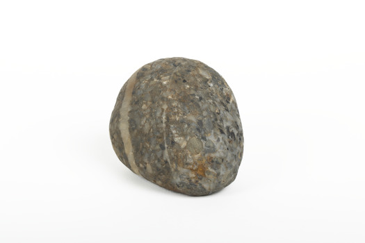 A solid rock specimen with a mineral vein in shades of brown 