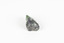 A small solid mineral specimen that is primarily pale green and blue-grey with speckles of beige and white.