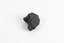 A small solid mineral specimen that is blue-grey in colour with rust brown specks throughout.