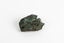 A hand-sized solid mineral specimen in shades of blue, green and copper.