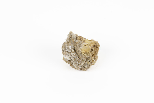 A small lead carbon specimen in shades of white, cream and brown. 