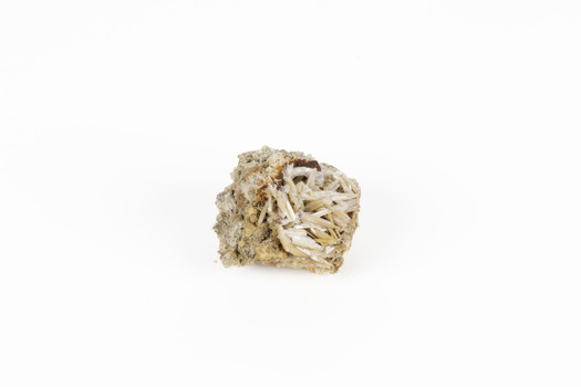 A small lead carbon specimen in shades of white, cream and brown. 