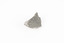 A small sized solid mineral specimen in shades cream and grey