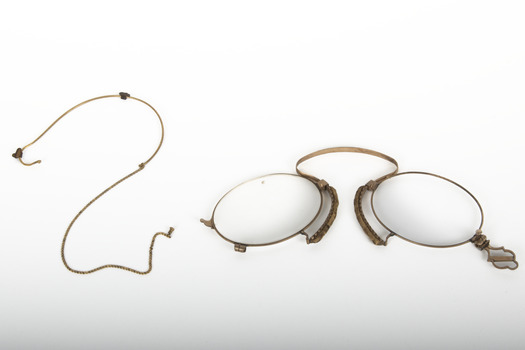 A small pair of spectacles.