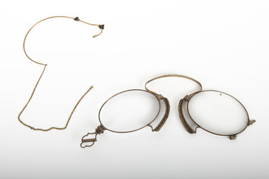 A small pair of spectacles.