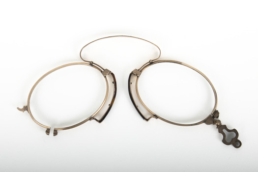 A small pair of spectacles.