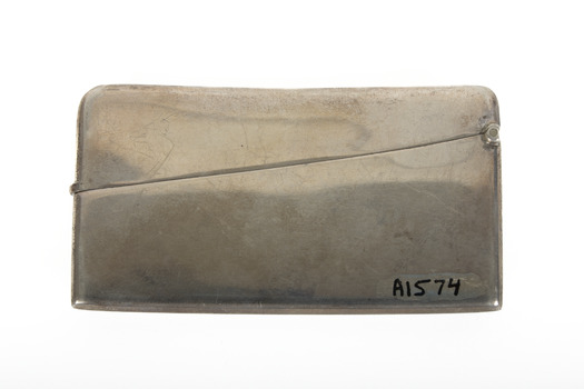 A small rectangular silver case for calling cards.