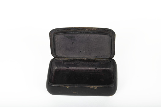 The inside of a small black rectangular box
