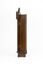 Right side view of a deep brown wooden striking mantle clock showing two small golden door hinges.