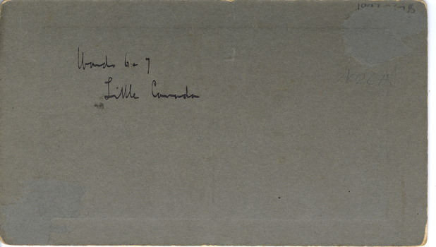 Back of Photograph with black ink inscriptions.