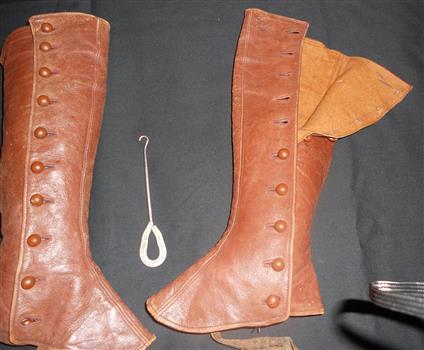 Clothing, boy's leather leggings and button hook