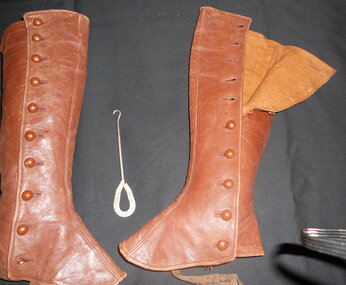 Clothing, boy's leather leggings and button hook